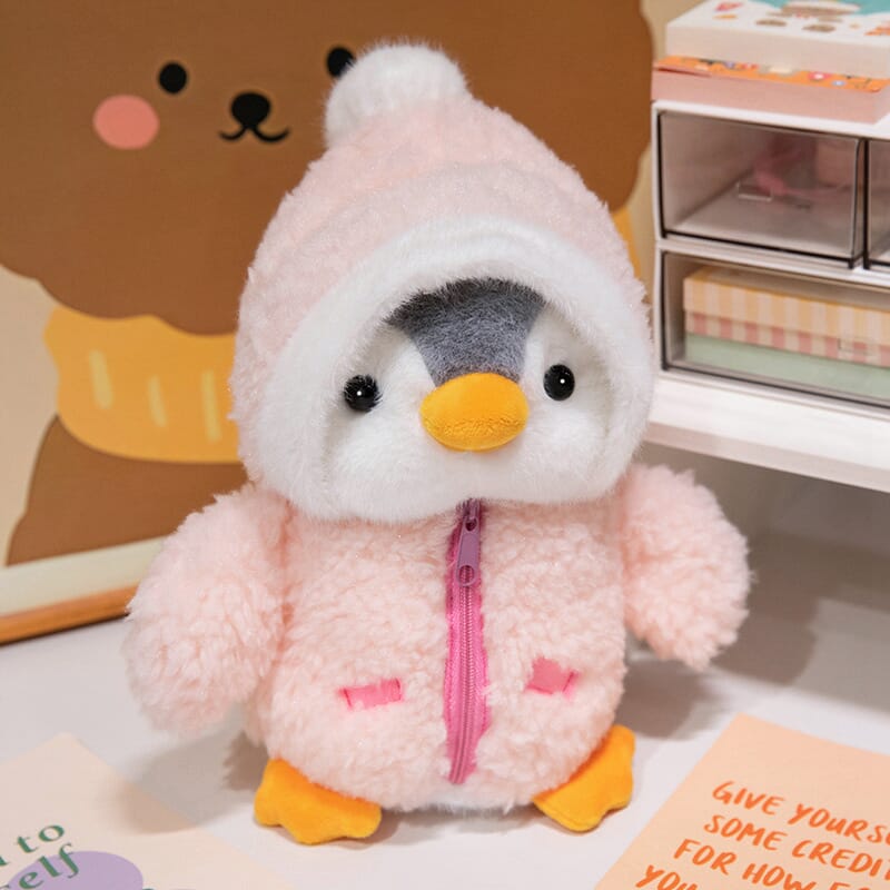 Adorable plush penguin with clothes, ideal for interactive play Cuddly penguin plush toy with dress-up options, perfect for toddlers