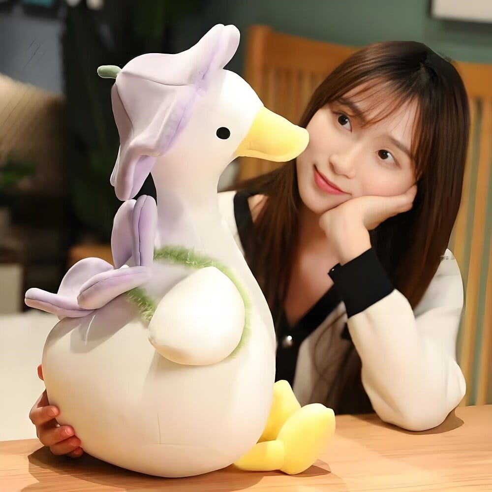 Flower duck plush toy, perfect addition to your stuffed animal collection Cute floral duck plush, soft and adorable gift for kids Flower duck stuffed toy, vibrant and cute plush for decoration