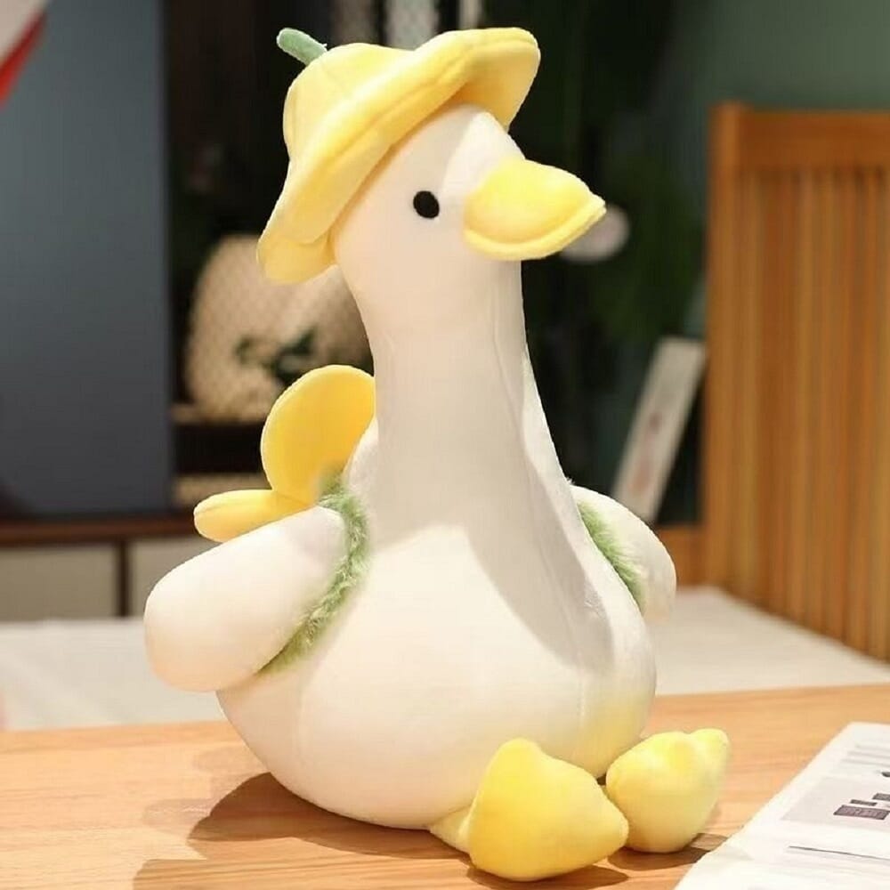 Flower duck plush, a charming and soft stuffed toy for home décor Adorable flower duck plush, perfect for cuddling and decorating Floral duck plush toy, ideal for kids' rooms and spring décor Cute flower duck plushie, bright and cheerful stuffed animal