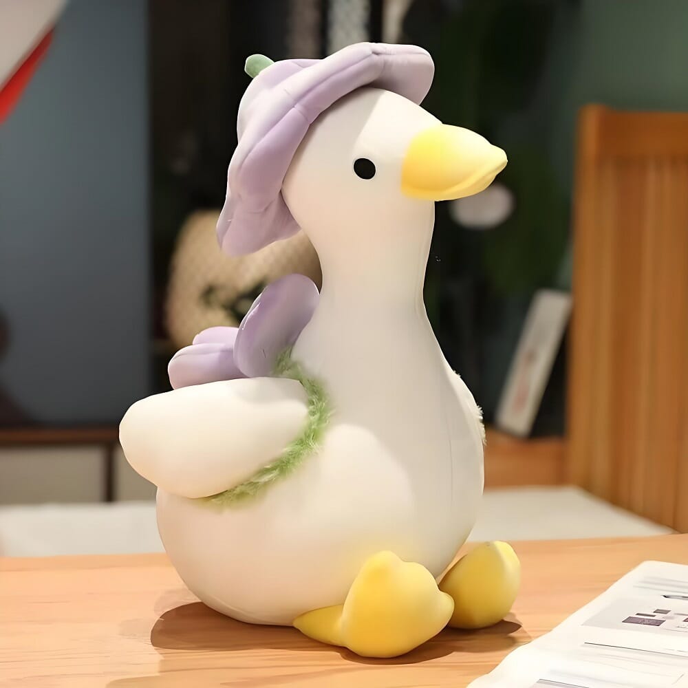 Flower duck plush toy, colorful and fun stuffed animal gift Floral-themed duck plush, perfect for decorating children's spaces Little flower duck plush, soft and vibrant plushie for all ages Flower duck stuffed toy, a cute plush toy for seasonal décor