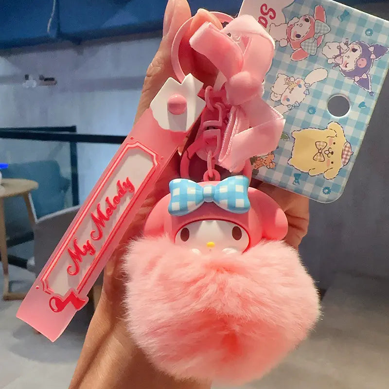 Cute Sanrio soft fluffy fur plush keychain, perfect for gifting Sanrio soft fluffy fur plush keychain, playful and stylish small accessory Sanrio plush keychain with fluffy fur, perfect for cozy and cute bag charm Soft fluffy fur plush keychain, fun acces
