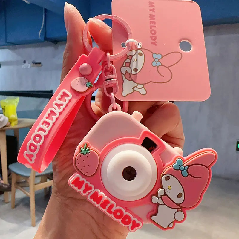 Cute plush star projection camera keychain by Sanrio, perfect for gifting Sanrio plush star projection camera keychain, charming and unique bag accessory Sanrio keychain with star projection camera plush toy, cute and functional accessory