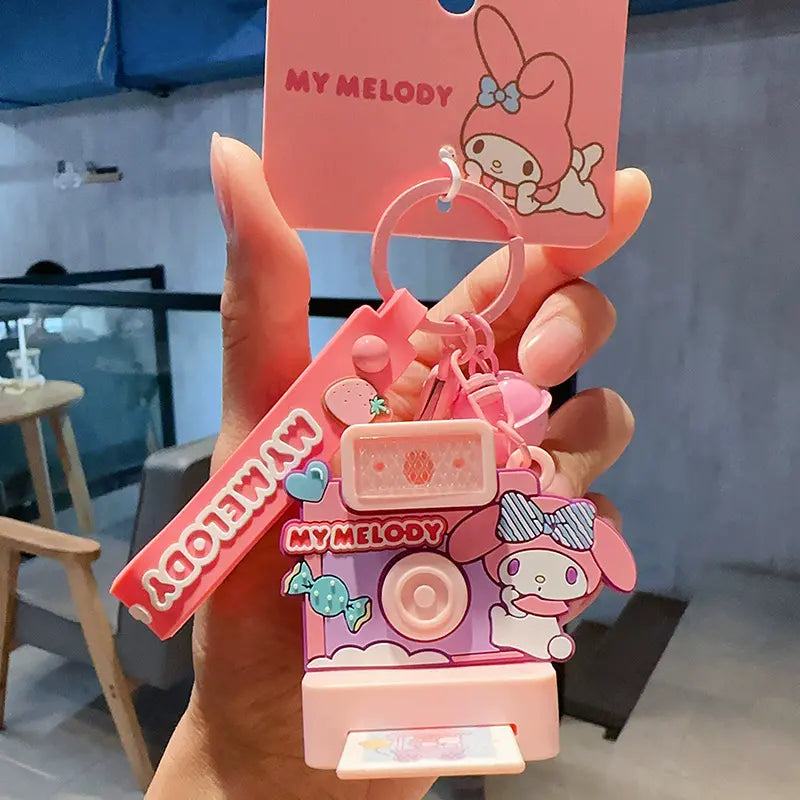 Sanrio Polaroid plush keychain, unique photo camera design for daily use Sanrio plush Polaroid keychain, cute mini accessory for on-the-go Polaroid plush keychain by Sanrio, adorable camera keychain for bags