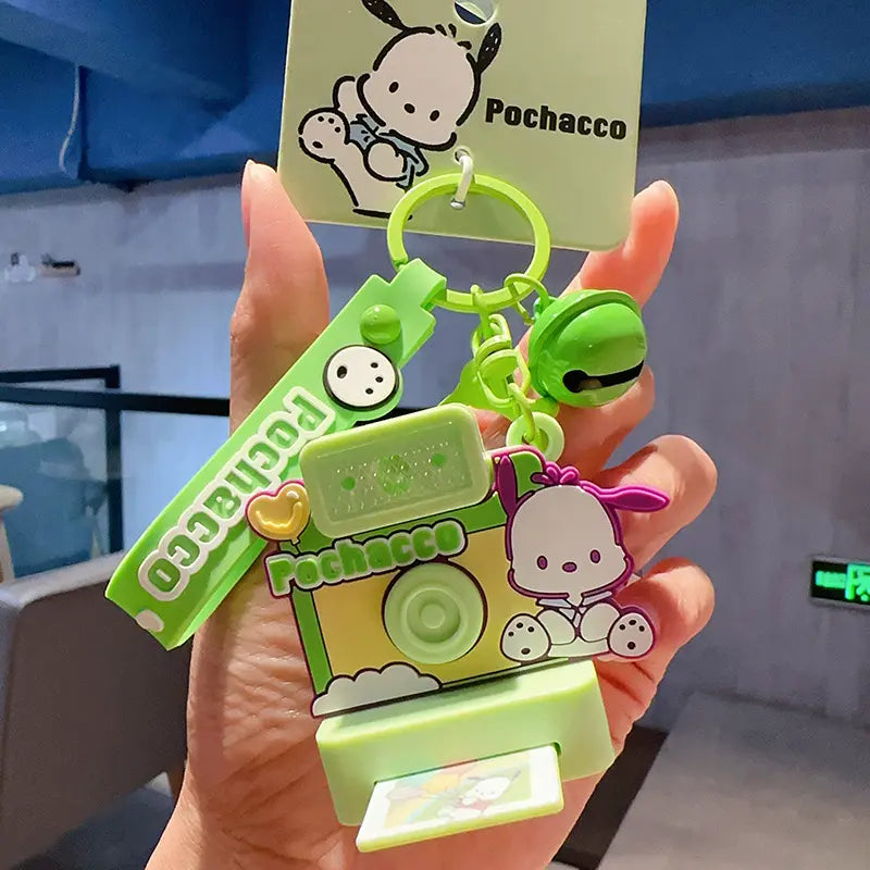 Sanrio Polaroid plush keychain, cute small accessory for bags Sanrio plush keychain, adorable Polaroid camera design for accessories Cute Sanrio Polaroid plush keychain, fun small accessory for bags and backpacks