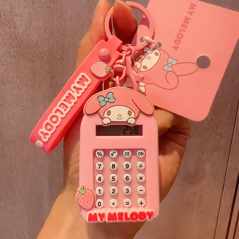 Sanrio mini calculator keychain, perfect for keeping on key rings or backpacks Mini Sanrio portable calculator, cute and functional keychain for on-the-go Sanrio portable calculator keychain, must-have small accessory for fans Sanrio mini calculator keych