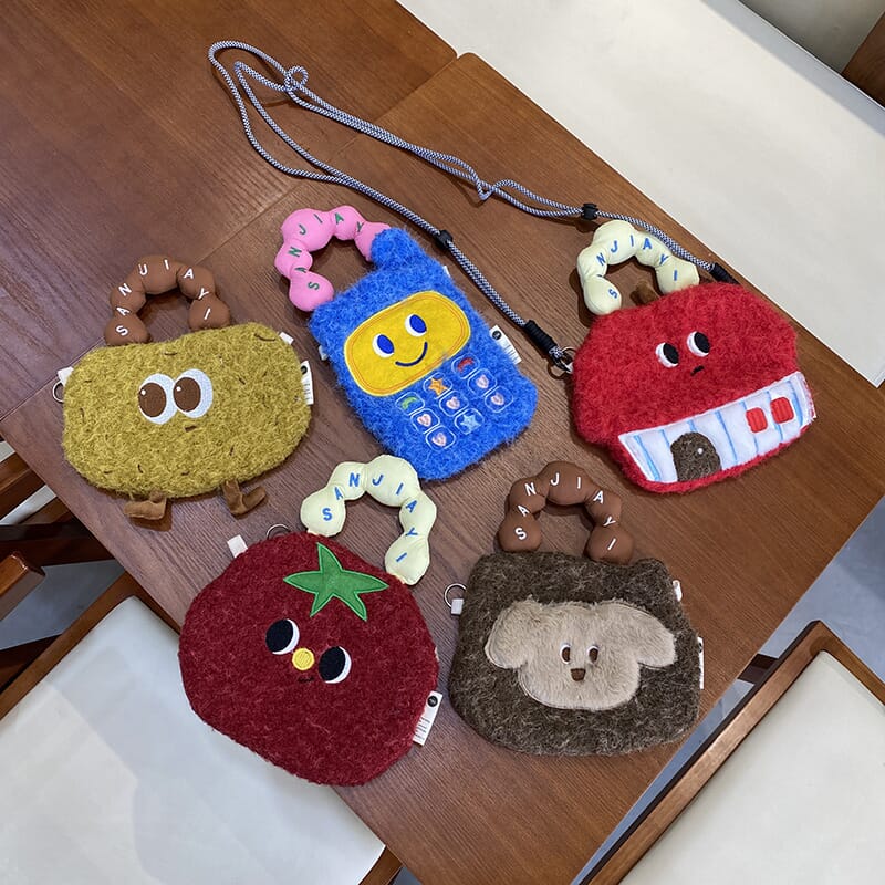 Kawaii cartoon phone bag with vibrant design  Compact and cute cartoon phone bag for easy carrying