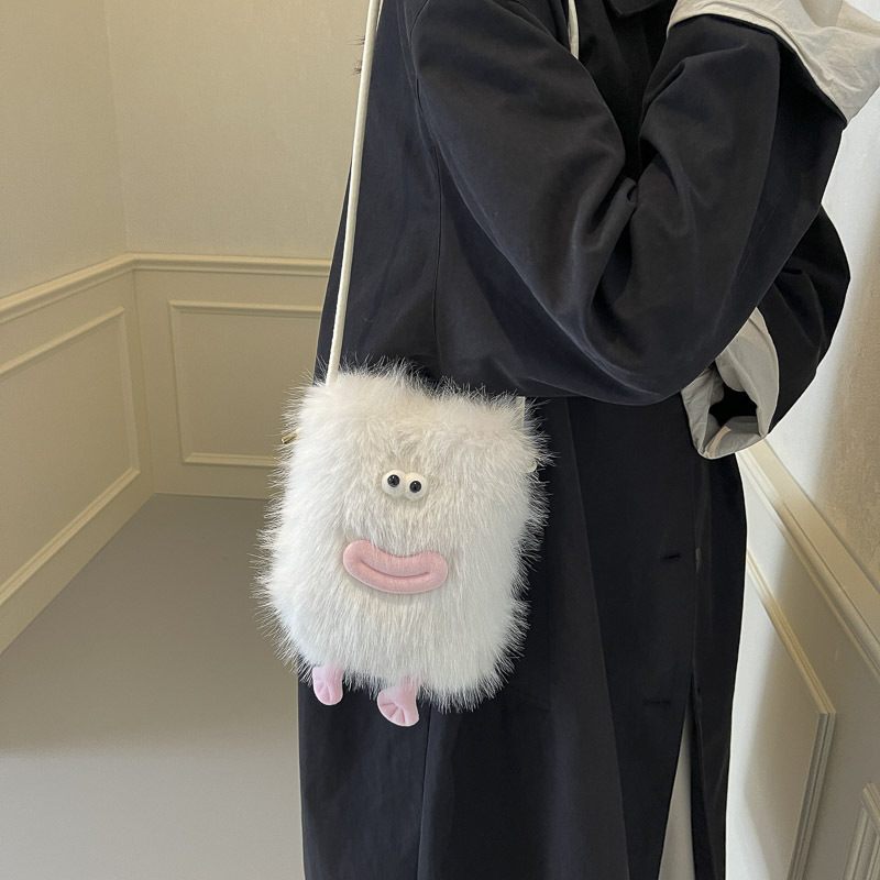 Niche cartoon phone pouch for modern fashion lovers  Playful cartoon phone bag for keeping your phone safe