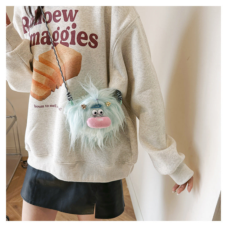 Quirky plush toy crossbody bag for playful vibes  Ugly-cute plush toy bag for fun and casual style  Kawaii-inspired plush toy handbag with unique design