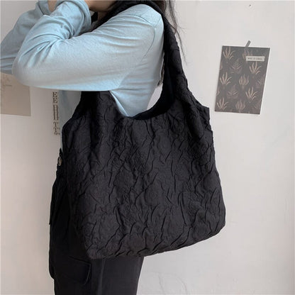 Japanese pleated fashion design, artistic aesthetic with a minimalist touch for a stylish look