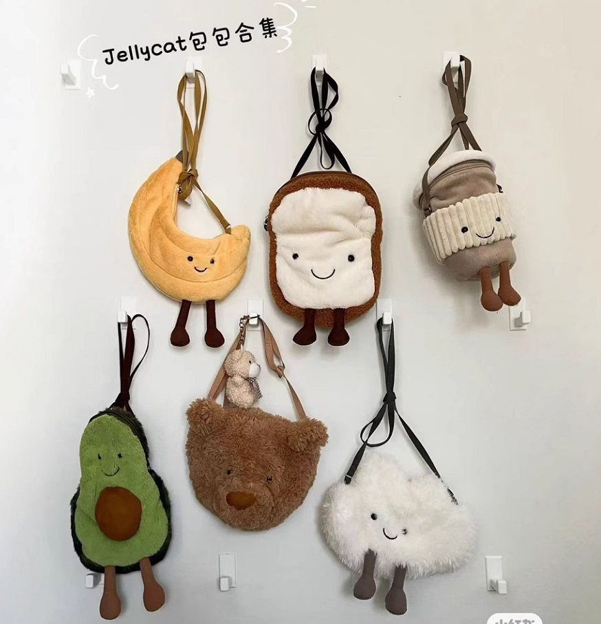 Fruit-themed Jellycat crossbody bag, banana sun design for a stylish and unique accessory