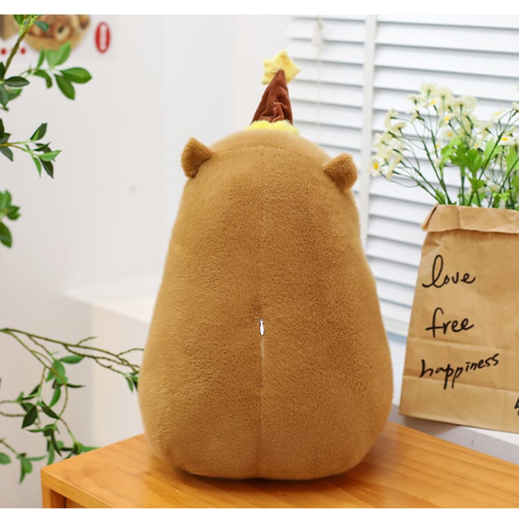 Kawaii capybara doll, plush toy with a fun cake hat for decoration