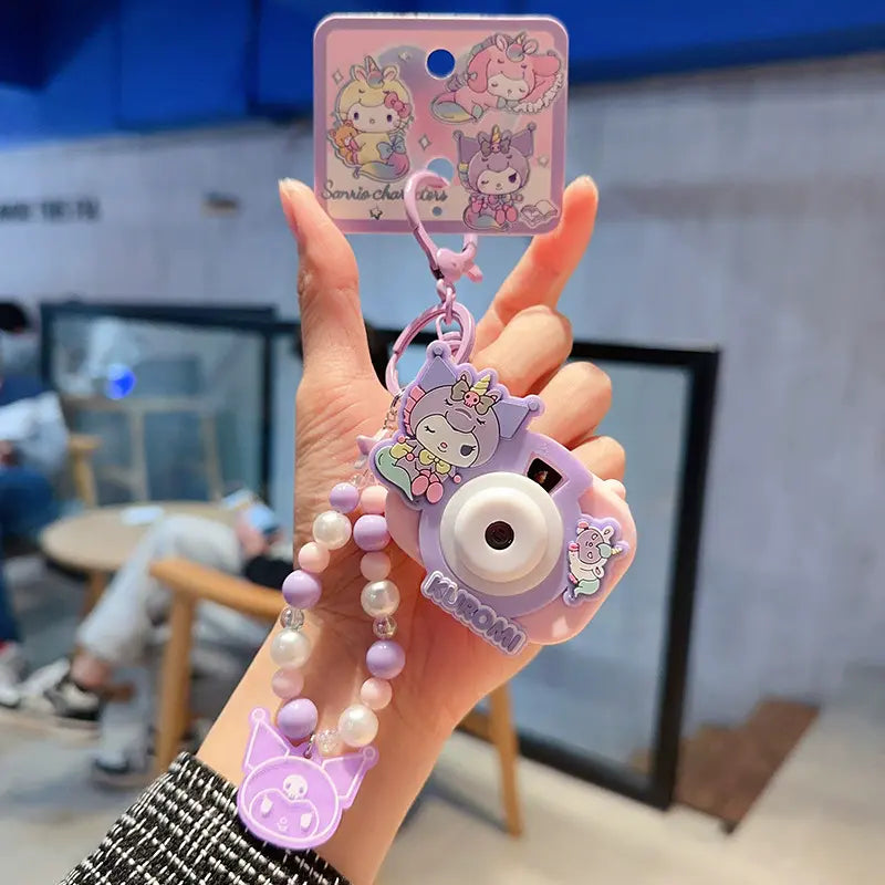 Sanrio unicorn camera keychain, soft plush keychain for everyday style Cute unicorn camera plush keychain, Sanrio accessory for bags and keyrings Sanrio plush unicorn camera keychain, perfect for Sanrio collectors