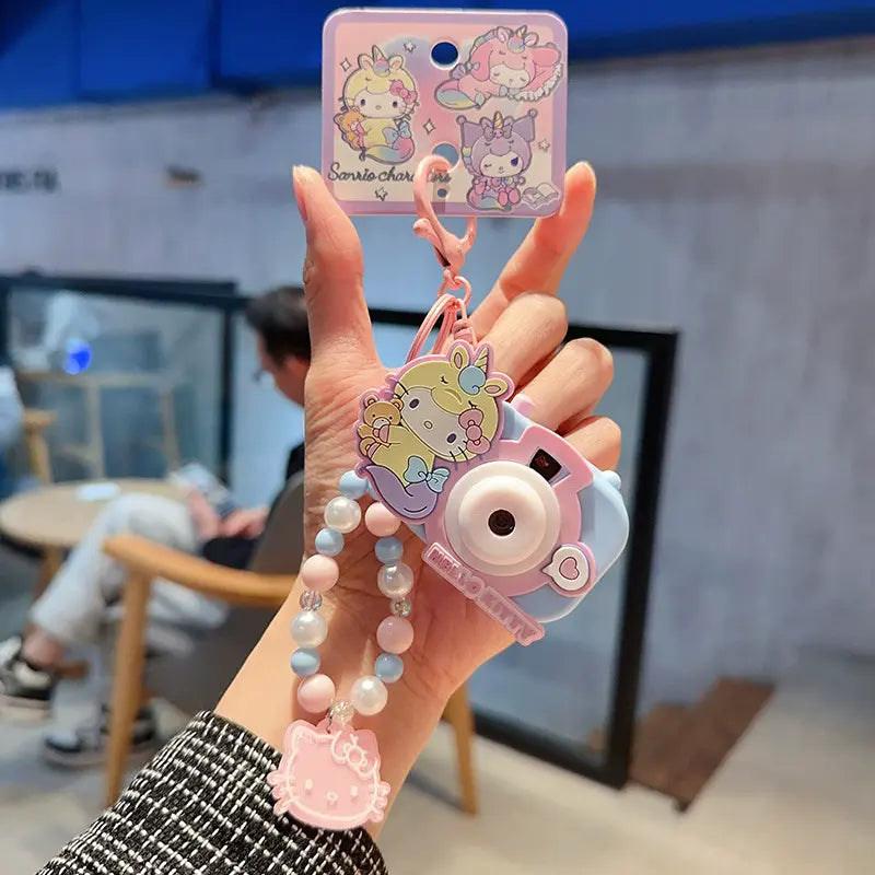 Sanrio unicorn camera plush keychain, perfect keychain for anime lovers Sanrio unicorn camera plush keychain, charming accessory for unicorn fans Cute Sanrio unicorn camera plush keychain, stylish small accessory for bags